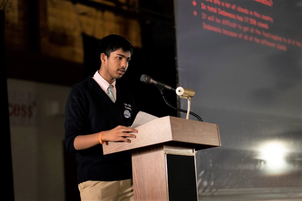 Distinguished NJ co-educational independent school male student speaking